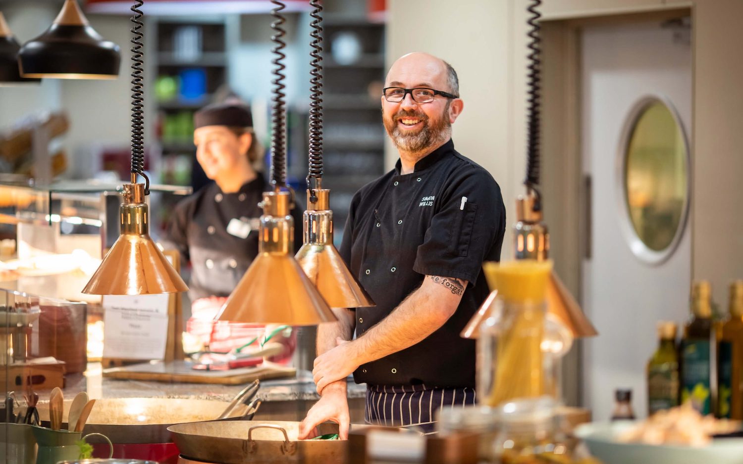 chef standing at food catering station Yarnfield Park