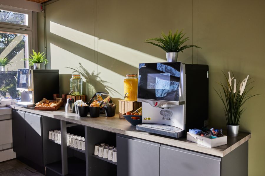 Hydration station with water, coffee machine and snacks at Yarnfield Park