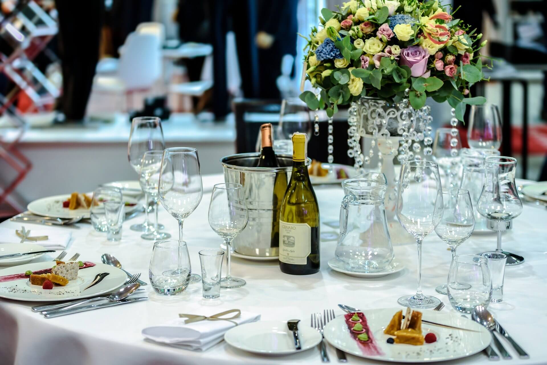 drinks and food on a dining table for a banquet